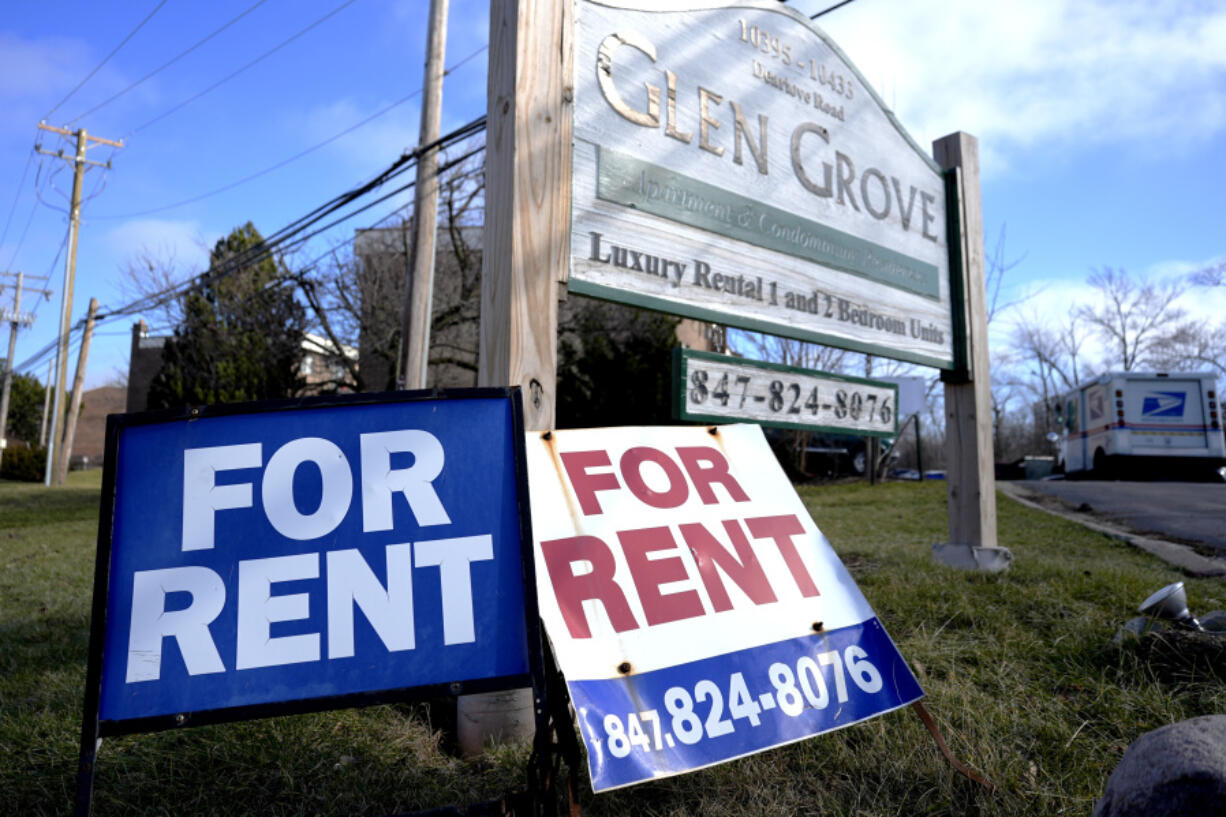 FILE - Signs for apartment rentals are displayed in Glenview, Ill., Jan. 29, 2024. (AP Photo/Nam Y.