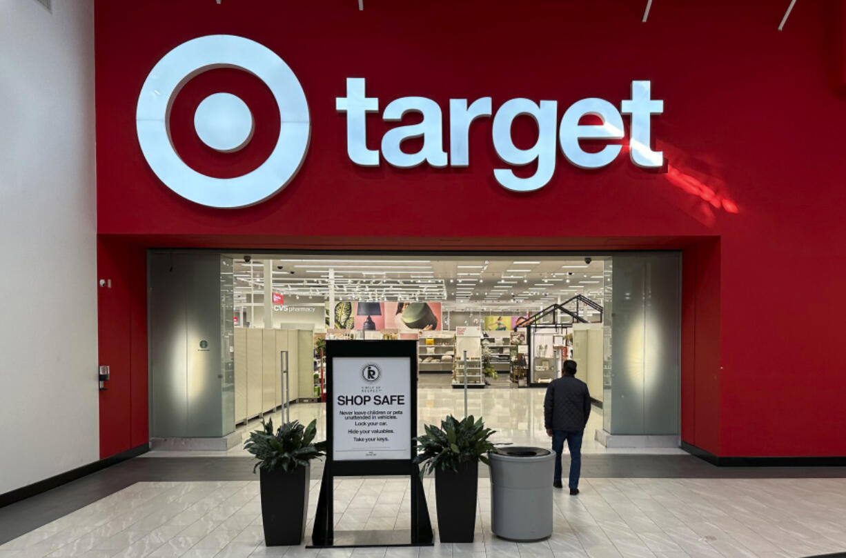 FILE - A shopper heads into a Target store on Jan. 11, 2024, in Lakewood, Colo.