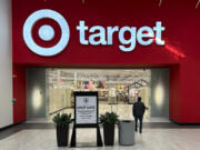 FILE - A shopper heads into a Target store on Jan. 11, 2024, in Lakewood, Colo.