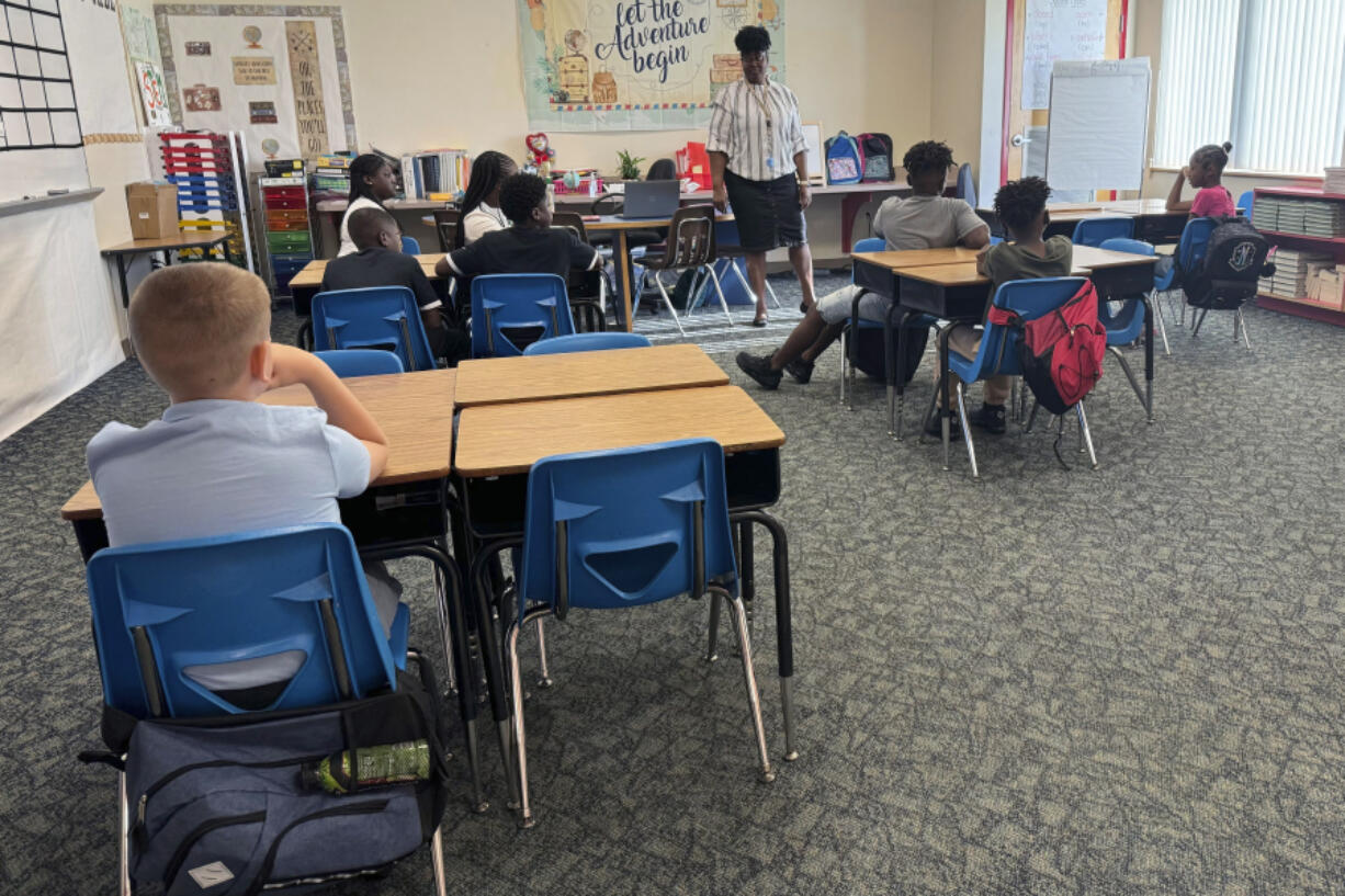 Mannika Hopkins talks with her fourth graders on the first day of school at Greenville Elementary in Greenville, Fla. on Aug. 14, 2024.