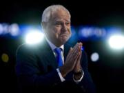 Democratic vice presidential nominee Minnesota Gov. Tim Walz reacts during the Democratic National Convention Wednesday, Aug. 21, 2024, in Chicago.