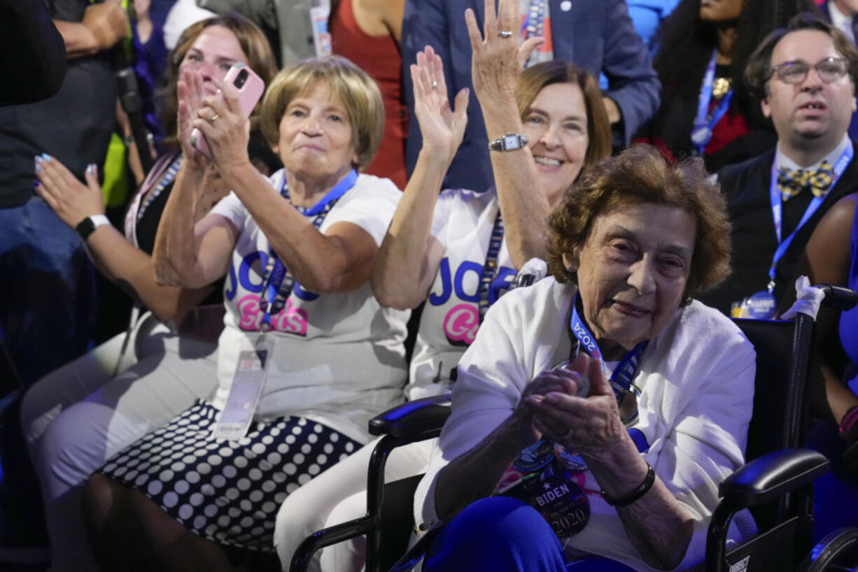 Delegates applaud during the first day of Democratic National Convention, Monday, Aug. 19, 2024, in Chicago.