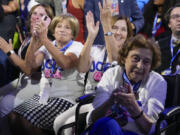 Delegates applaud during the first day of Democratic National Convention, Monday, Aug. 19, 2024, in Chicago.