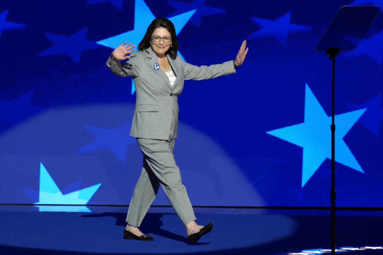 Rep. Suzan Delbene, D-Wash., walks on stage to speak during the Democratic National Convention Wednesday, Aug. 21, 2024, in Chicago. (AP Photo/J.