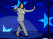 Rep. Suzan Delbene, D-Wash., walks on stage to speak during the Democratic National Convention Wednesday, Aug. 21, 2024, in Chicago. (AP Photo/J.