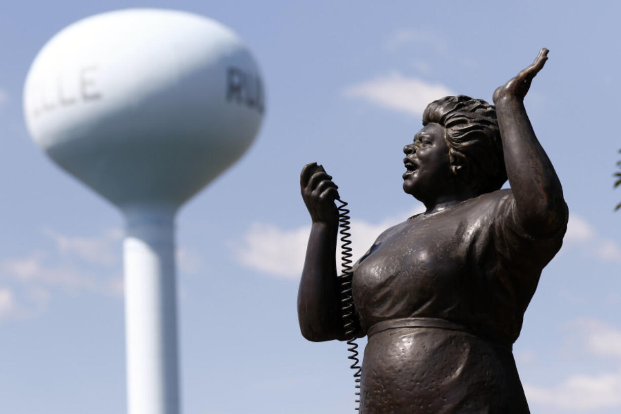 FILE - A statue of the late civil rights activist Fannie Lou Hamer is displayed in a memorial garden in her hometown of Ruleville, Miss., on Oct. 5, 2017. (AP Photo/Rogelio V.