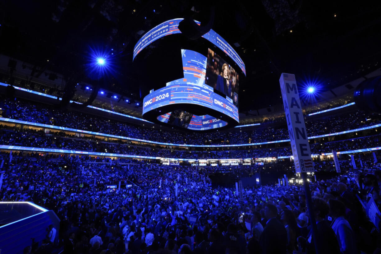 Democratic presidential nominee Vice President Kamala Harris is seen on a video monitor after the roll call during the Democratic National Convention Tuesday, Aug. 20, 2024, in Chicago.