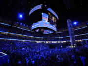 Democratic presidential nominee Vice President Kamala Harris is seen on a video monitor after the roll call during the Democratic National Convention Tuesday, Aug. 20, 2024, in Chicago.