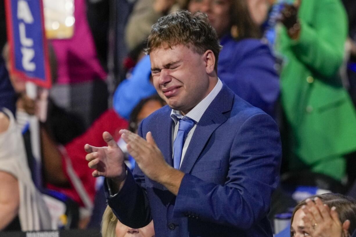 Gus Walz cries as Democratic vice presidential nominee Minnesota Gov. Tim Walz speaks during the Democratic National Convention Wednesday, Aug. 21, 2024, in Chicago.