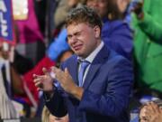 Gus Walz cries as Democratic vice presidential nominee Minnesota Gov. Tim Walz speaks during the Democratic National Convention Wednesday, Aug. 21, 2024, in Chicago.