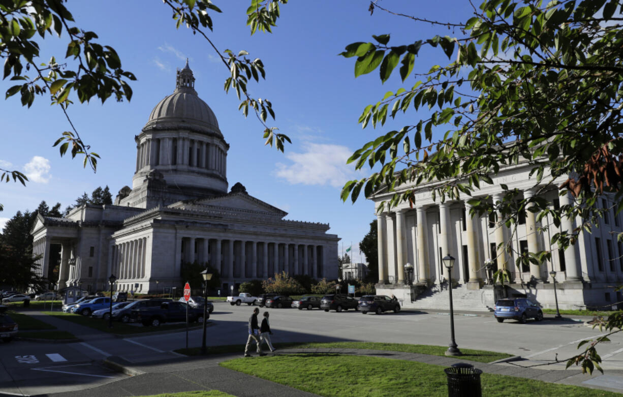 FILE - The Capitol in Olympia, Wash., is pictured Oct. 9, 2018. Five months after holding its presidential primaries, Washington state is looking further down the ticket to select candidates to compete for federal and state offices in the November 2024 elections. (AP Photo/Ted S.