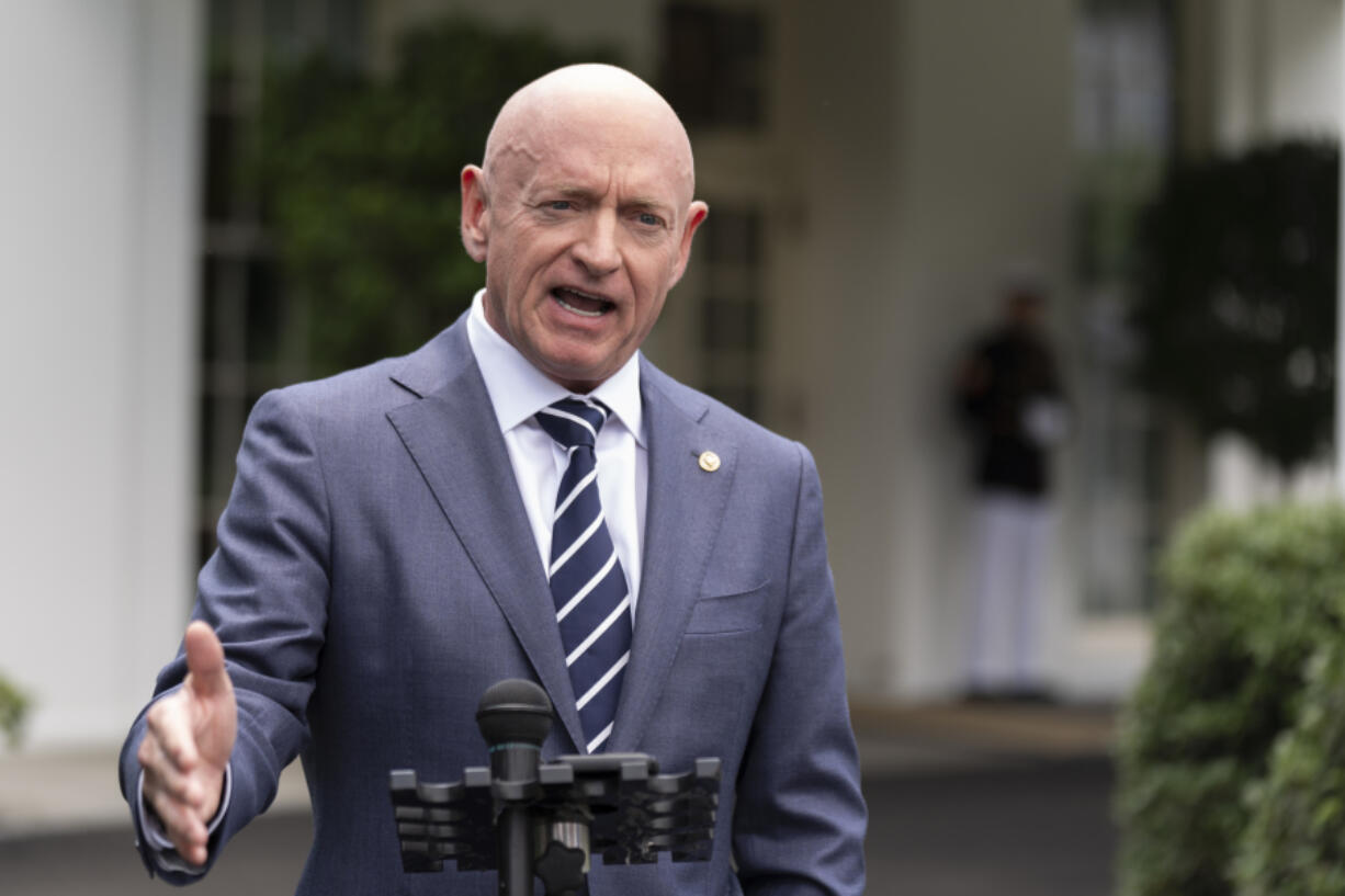 FILE - Sen. Mark Kelly, D-Ariz., speaks about the southern border outside the West Wing of the White House, Tuesday, June 4, 2024, in Washington.