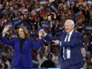 Democratic presidential nominee Vice President Kamala Harris and running mate Minnesota Gov. Tim Walz appear at the Fiserv Forum during a campaign rally in Milwaukee, Tuesday, Aug. 20, 2024.