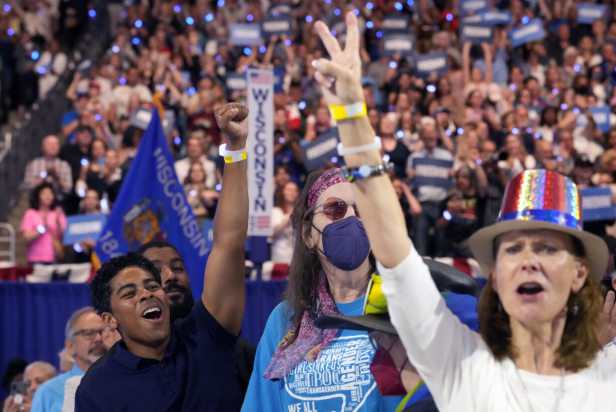 Supporters cheer as Democratic presidential nominee Vice President Kamala Harris speaks at the Fiserv Forum during a campaign rally in Milwaukee, Tuesday, Aug. 20, 2024.