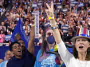 Supporters cheer as Democratic presidential nominee Vice President Kamala Harris speaks at the Fiserv Forum during a campaign rally in Milwaukee, Tuesday, Aug. 20, 2024.