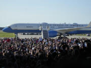 Air Force Two with Democratic presidential nominee Vice President Kamala Harris and her running mate Minnesota Gov. Tim Walz aboard arrive for a campaign rally Wednesday, Aug. 7, 2024, in Romulus, Mich.