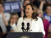 FILE - Democratic presidential nominee Vice President Kamala Harris speaks at a campaign rally, Aug. 7, 2024, in Romulus, Mich.