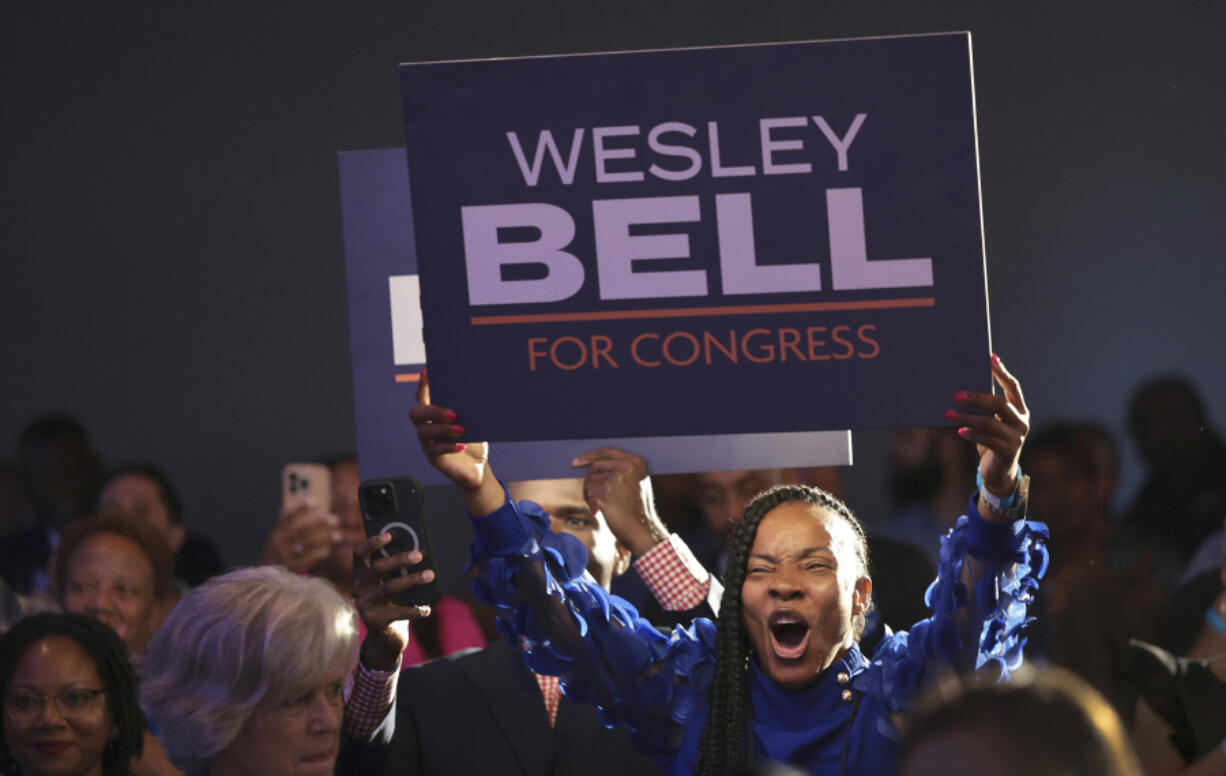 Wesley Bell supporter Shawntelle Fisher cheers for Bell as he wins the Democratic congressional primary against incumbent U.S. Rep. Cori Bush on Tuesday, Aug. 6, 2024 at the Marriott Grand Hotel in downtown St. Louis. (Robert Cohen/St.