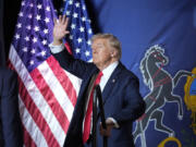 Republican presidential candidate former President Donald Trump gestures to the crowd after speaking at a campaign rally, Wednesday, July 31, 2024, in Harrisburg, Pa.