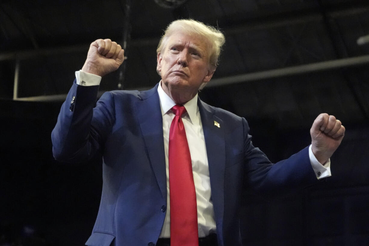 Republican presidential nominee former President Donald Trump dances after speaking at a campaign rally in Bozeman, Mont., Friday, Aug. 9, 2024.