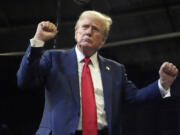 Republican presidential nominee former President Donald Trump dances after speaking at a campaign rally in Bozeman, Mont., Friday, Aug. 9, 2024.