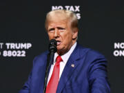 Republican presidential nominee former President Donald Trump speaks at a campaign rally Wednesday, Aug. 14, 2024, in Asheville, N.C.