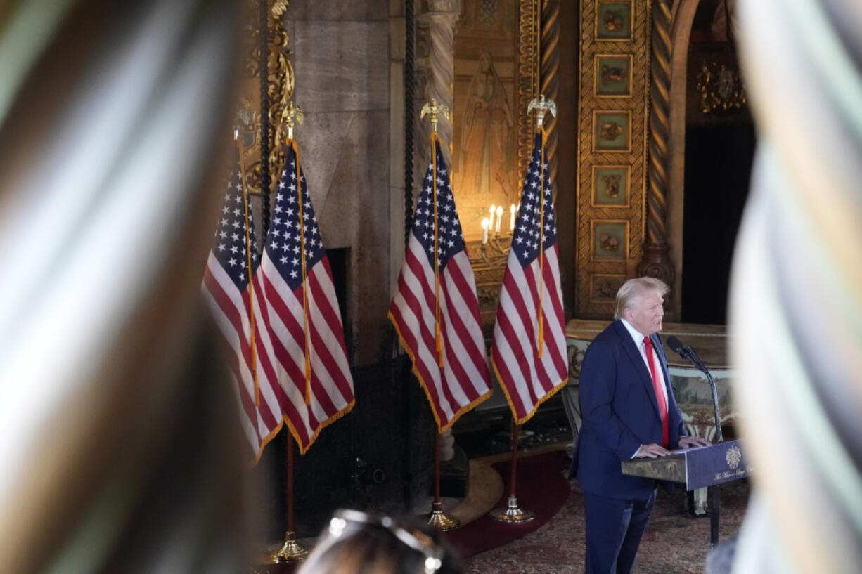 Republican presidential nominee former President Donald Trump speaks to reporters at his Mar-a-Lago estate Thursday, Aug. 8, 2024, in Palm Beach, Fla.