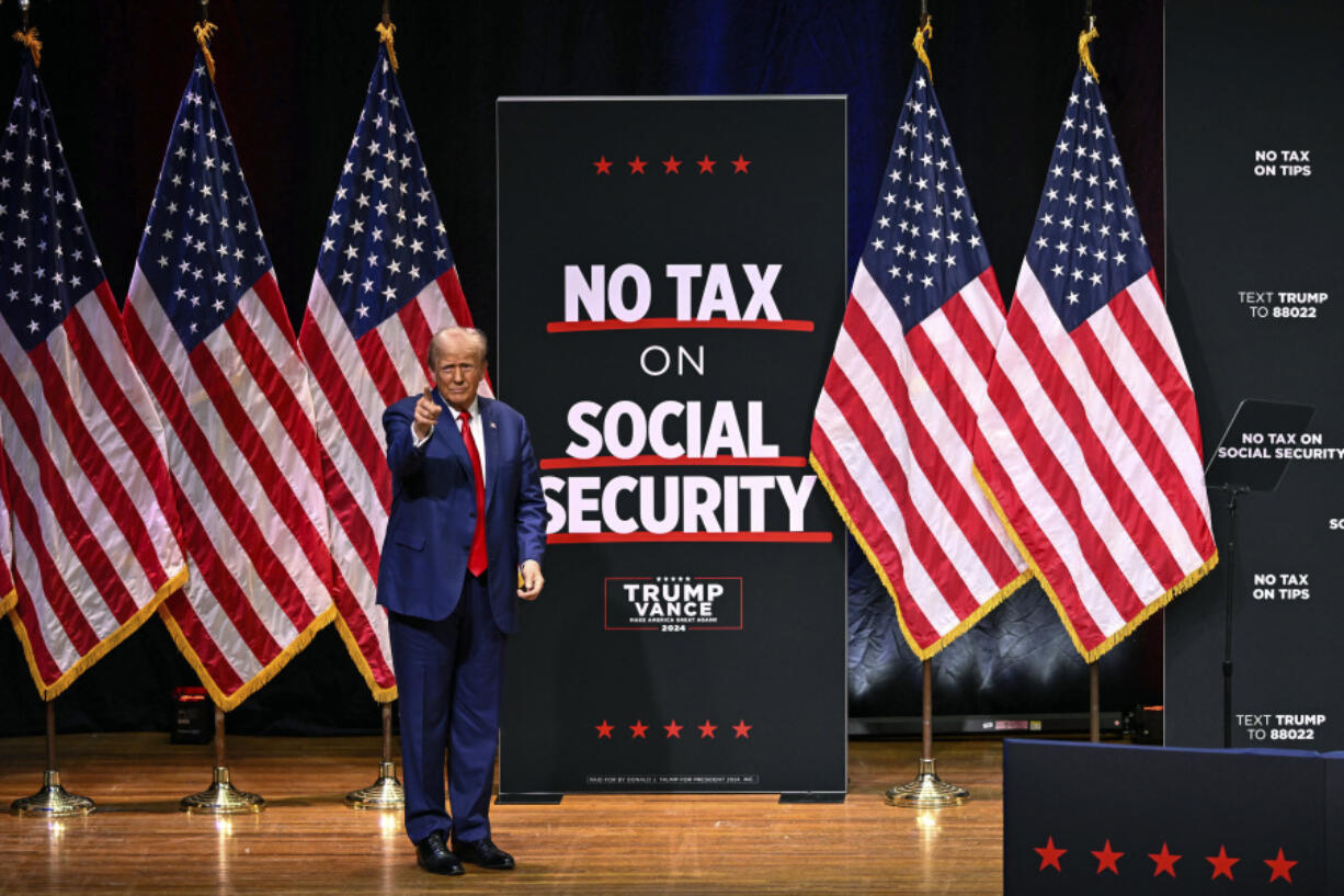 Republican presidential nominee former President Donald Trump arrives before speaking at a campaign rally Wednesday, Aug. 14, 2024, in Asheville, N.C.