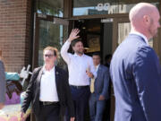 Republican vice presidential nominee Sen. JD Vance, R-Ohio, waves as he leaves with ice cream at Olson&#039;s Ice Cream Wednesday, Aug. 7, 2024, in Eau Claire, Wis.