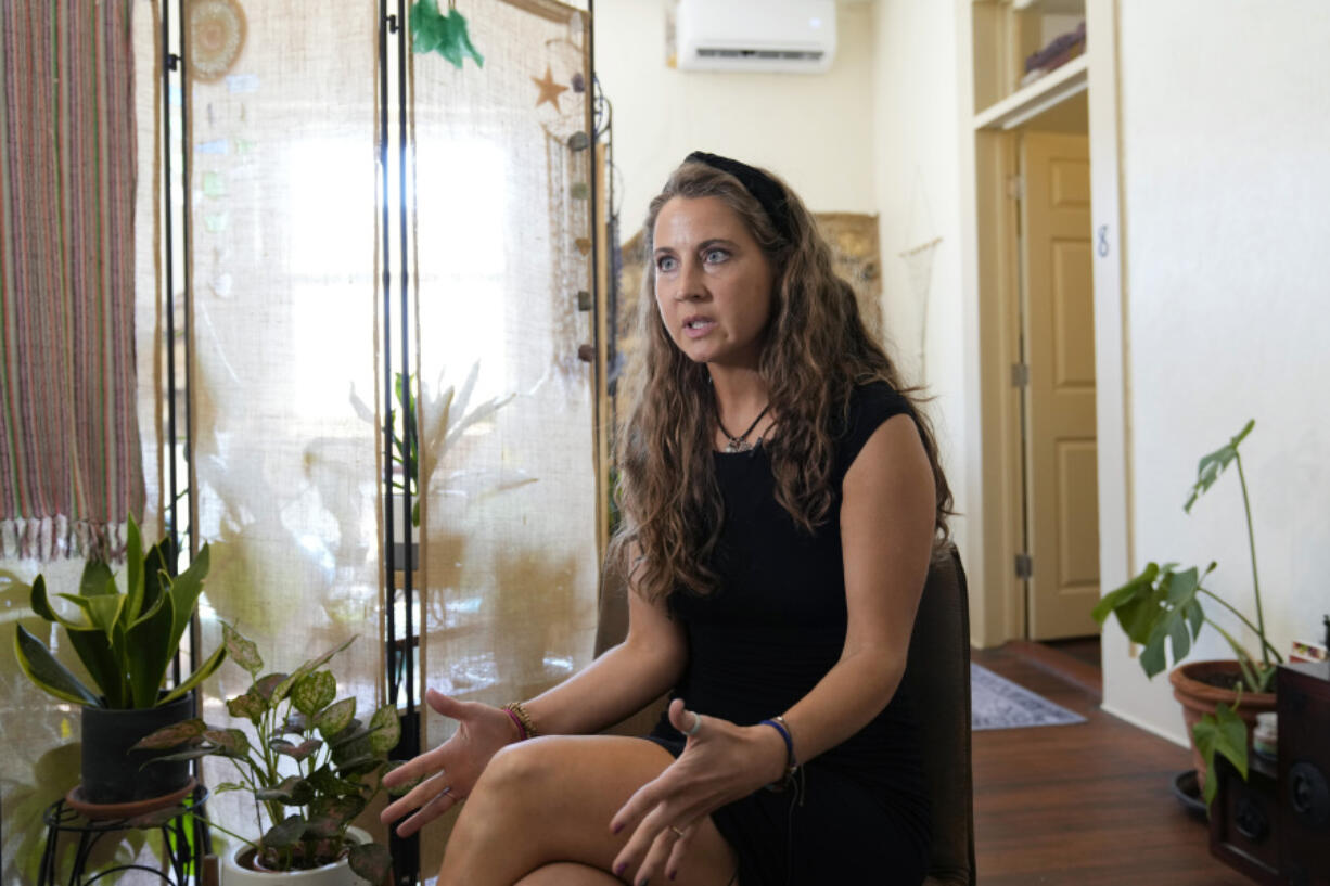 Kyleigh Thurman, one of the patients who is filing a federal complaint against an emergency room for not treating her ectopic pregnancy, talks about her experience at her studio, Wednesday, Aug. 7, 2024, in Burnet County, Texas.