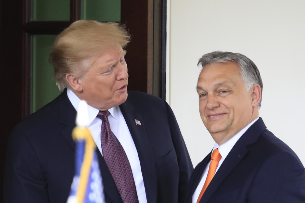 FILE - President Donald Trump, left, welcomes Hungarian Prime Minister Viktor Orban to the White House in Washington, on May 13, 2019.