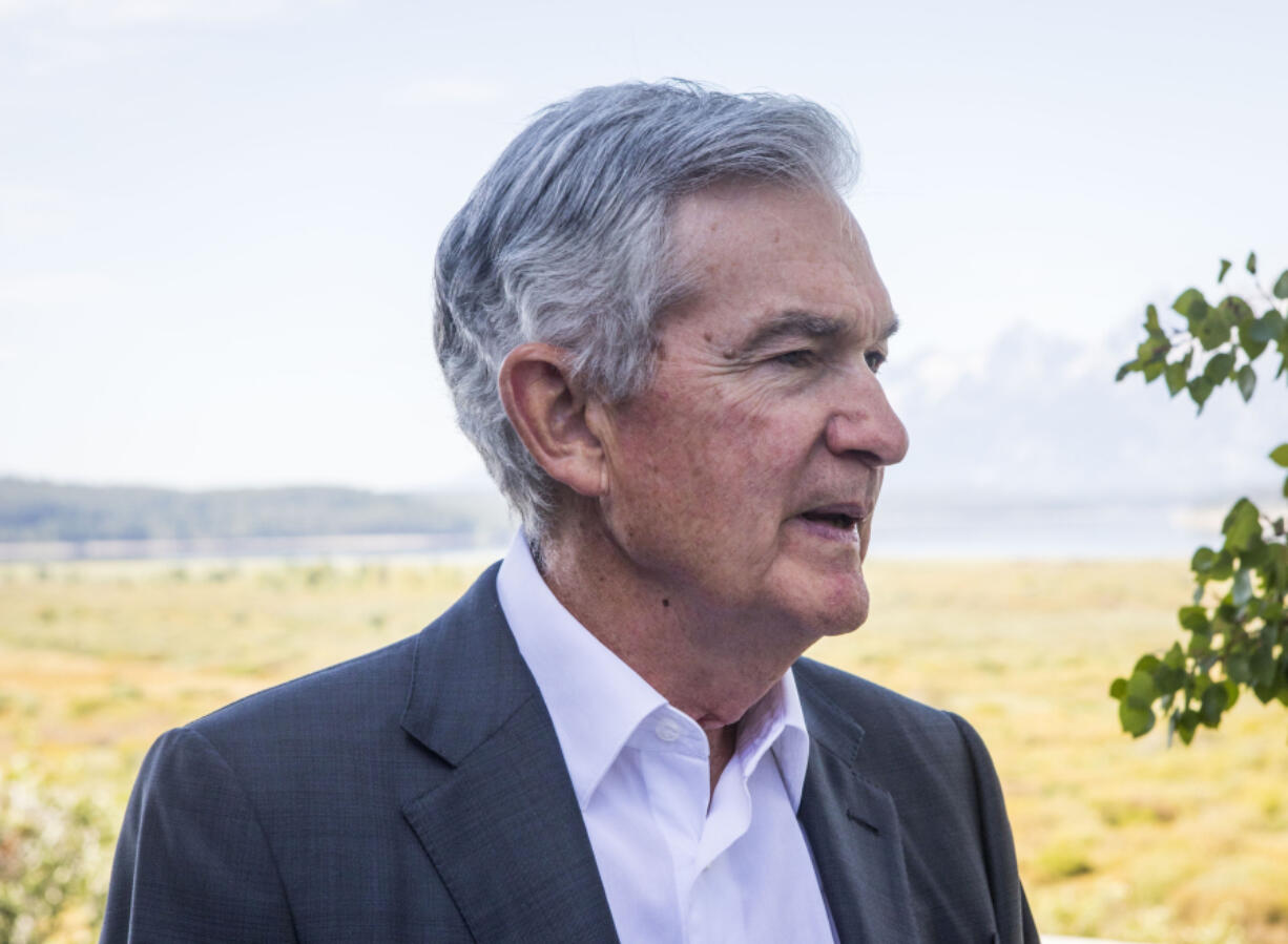 FILE Federal Reserve Chairman Jerome Powell takes a break during the Jackson Hole Economic Symposium near Moran in Grand Teton National Park, Wyo., Aug. 25, 2023.