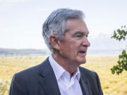 FILE Federal Reserve Chairman Jerome Powell takes a break during the Jackson Hole Economic Symposium near Moran in Grand Teton National Park, Wyo., Aug. 25, 2023.