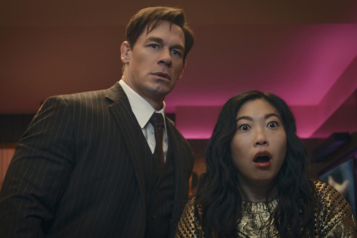 This image released by Prime Video shows John Cena, left, and Awkwafina in a scene from &ldquo;Jackpot!&rdquo; (Prime Video via AP)