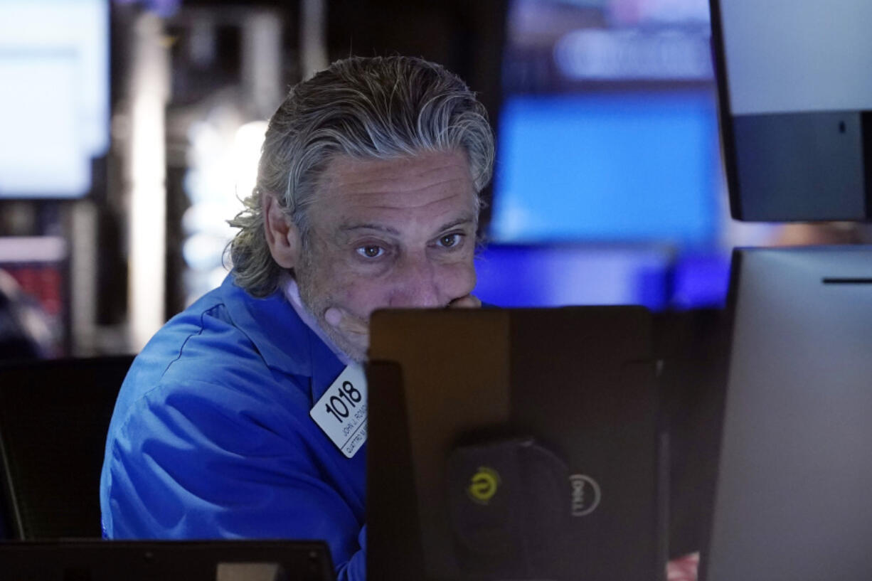 FILE - Trader John Romolo works on the floor of the New York Stock Exchange, Aug. 2, 2024. Japan&#039;s benchmark Nikkei 225 stock index has lost 12.4% on Monday, August 5, 2024, in the latest bout of sell-offs that are jolting world markets.