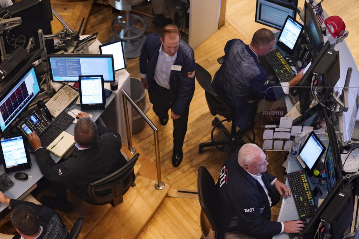 Traders work on the floor of the New York Stock Exchange, Monday, Aug. 5, 2024.