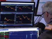 A trader works on the floor of the New York Stock Exchange, Wednesday, Aug. 7, 2024.