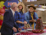 This image released by Netflix shows judges, from left, Bill Yosses, Sandra Lee and Bryan Ford in a scene from the baking competition series &ldquo;Blue Ribbon Baking Championship.&rdquo; (Netflix via AP)