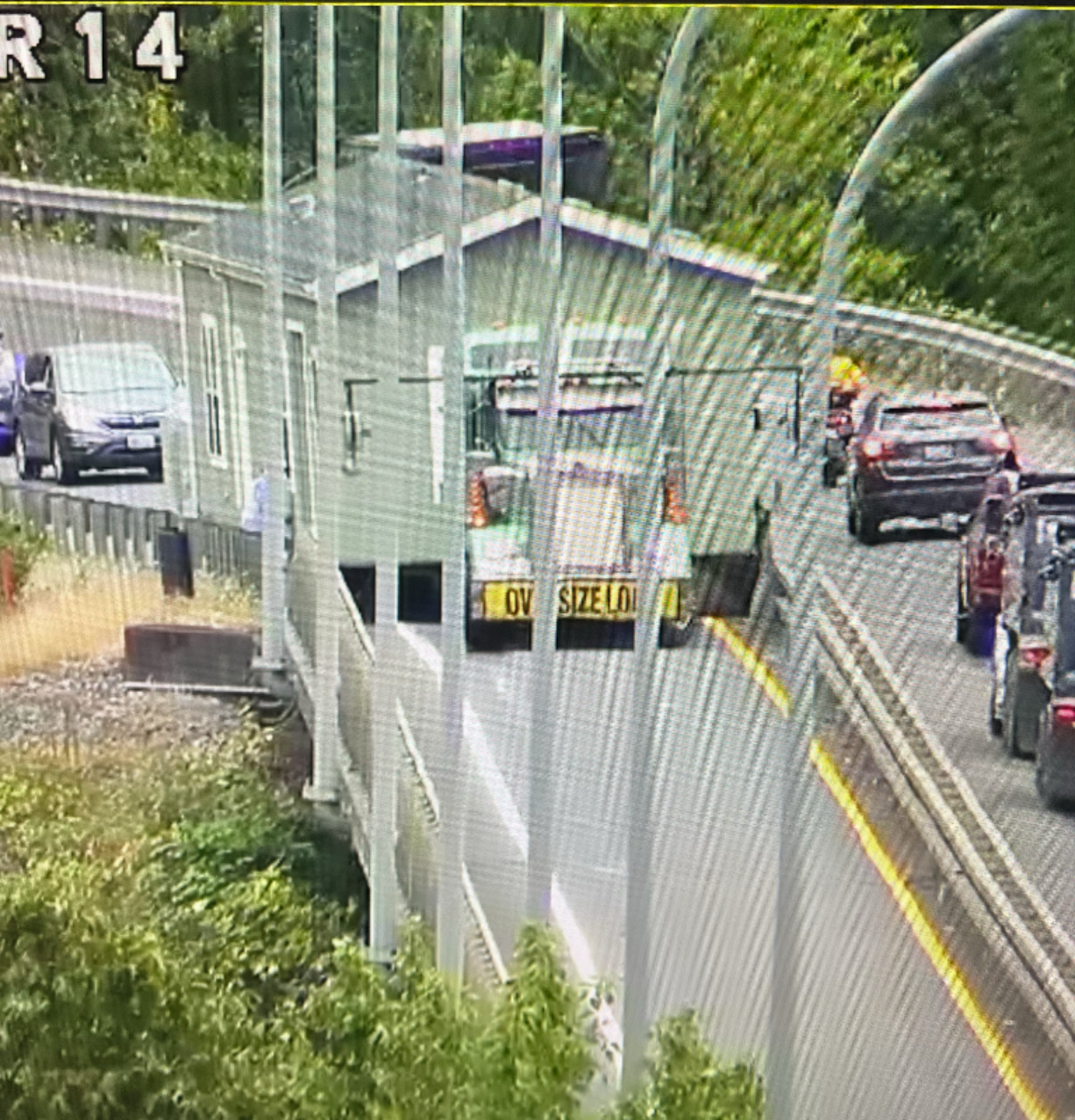 A manufactured home got stuck between railings on the Camas Slough Bridge.