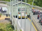 A manufactured home got stuck between railings on the Camas Slough Bridge.