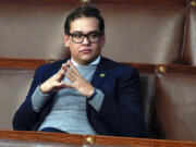 FILE - Rep. George Santos, R-N.Y., waits for the start of a session in the House chamber in Washington, Jan. 6, 2023.