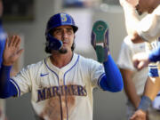 Seattle Mariners&#039; Josh Rojas reacts after scoring against the San Francisco Giants during the fifth inning of a baseball game, Sunday, Aug. 25, 2024, in Seattle.