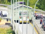 A manufactured home got stuck between railings on the Camas Slough Bridge on Aug. 22.