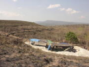 This photo provided by Gerrit van den Bergh shows the Mata Menge excavation site on the Indonesia island of Flores on Oct. 15, 2014. Researchers uncovered fossils at the site that suggest ancestors of the &ldquo;hobbits&rdquo; were even smaller and lived around 700,000 years ago.