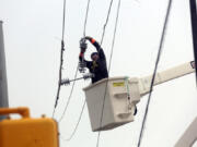 Utility crews work to restore electricity in Houston, July 11. Texas&rsquo; attorney general launched an investigation Monday into Houston&rsquo;s electric utility over allegations of fraud and waste following Hurricane Beryl.