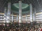 Muslims perform Friday prayers Aug. 9 at the Istiqlal mosque in Jakarta, Indonesia.