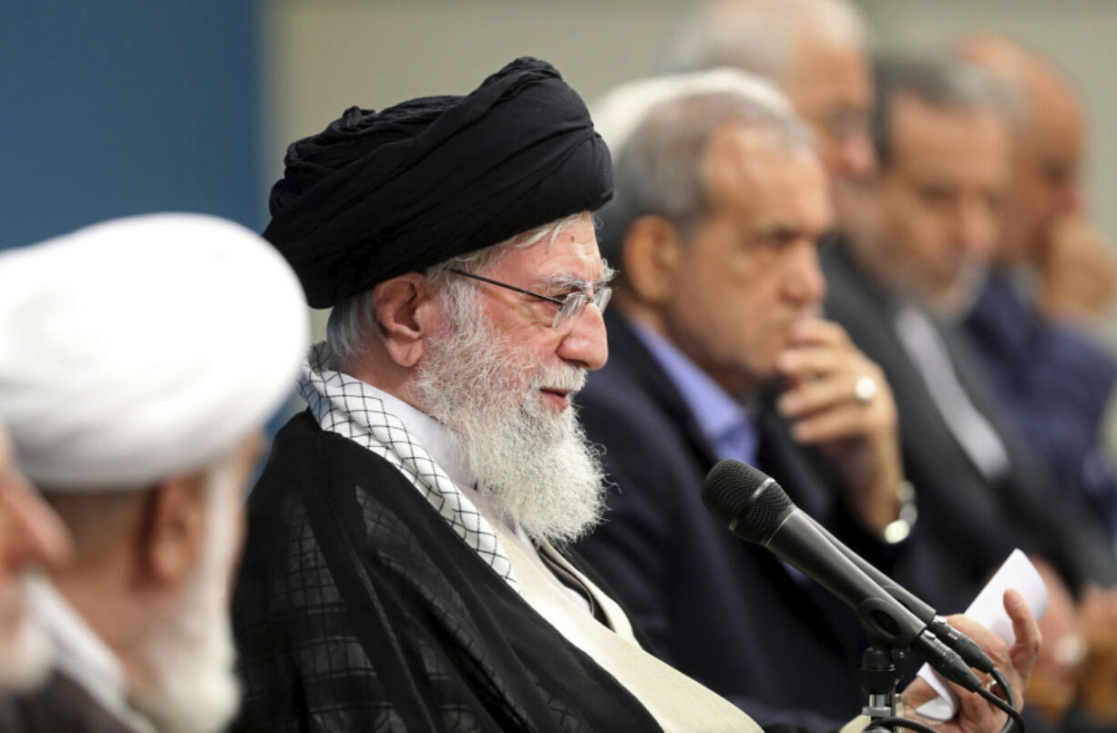 In this photo released by the official website of the office of the Iranian supreme leader, Supreme Leader Ayatollah Ali Khamenei speaks during a meeting with the President Masoud Pezeshkian&rsquo;s administration, in Tehran, Iran, Tuesday, Aug. 27, 2024.