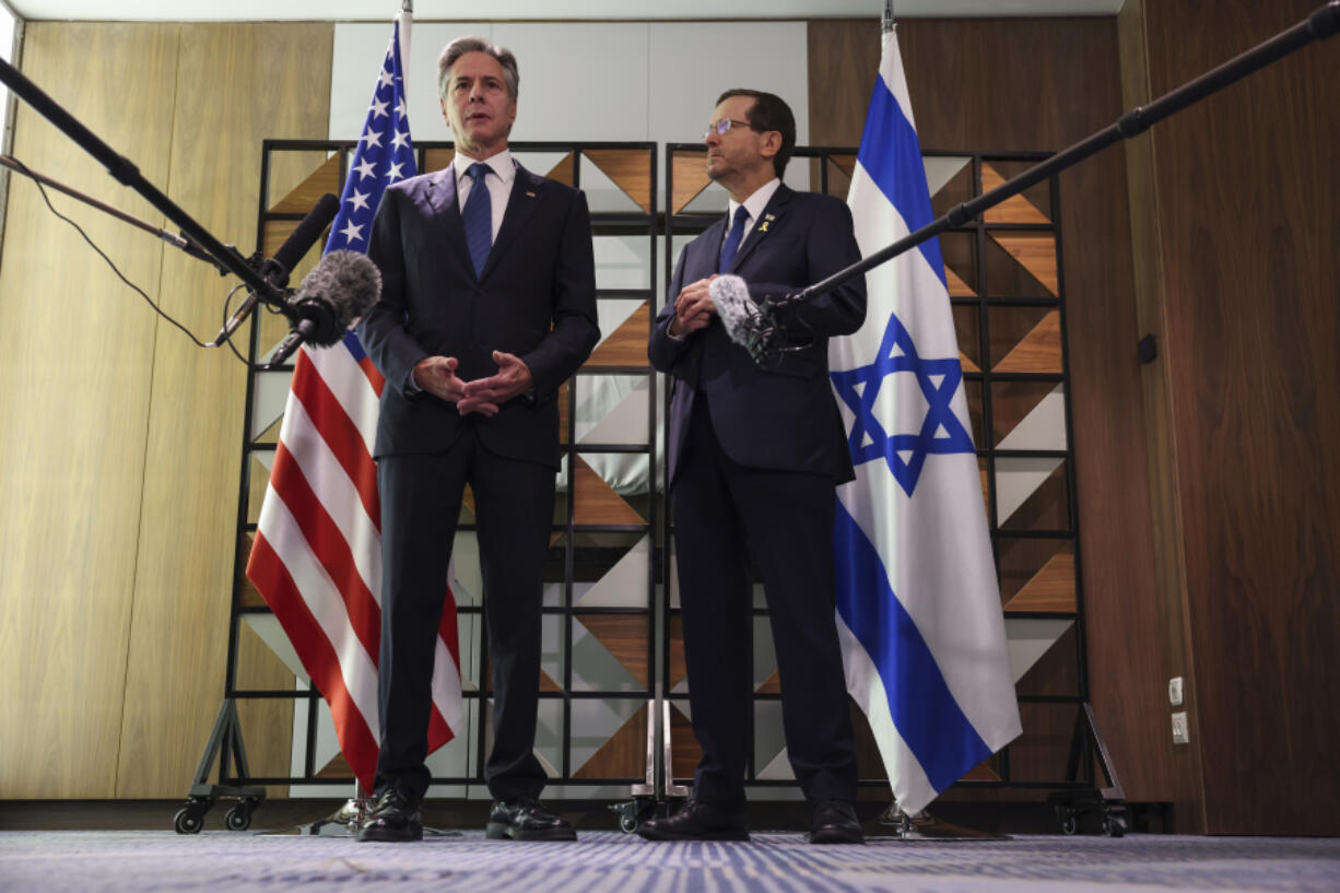 U.S. Secretary of State Antony Blinken, left, meets with Israel&rsquo;s President Isaac Herzog, in Tel Aviv, Israel, Monday, Aug. 19, 2024.