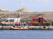 Emergency services at the scene of the search for a missing boat, in Porticello Santa Flavia, Italy, Monday, Aug. 19, 2024. British tech giant Mike Lynch, his lawyer and four other people are among those missing after their luxury superyacht sank during a freak storm off Sicily, Italy&rsquo;s civil protection and authorities said. Lynch&rsquo;s wife and 14 other people survived.