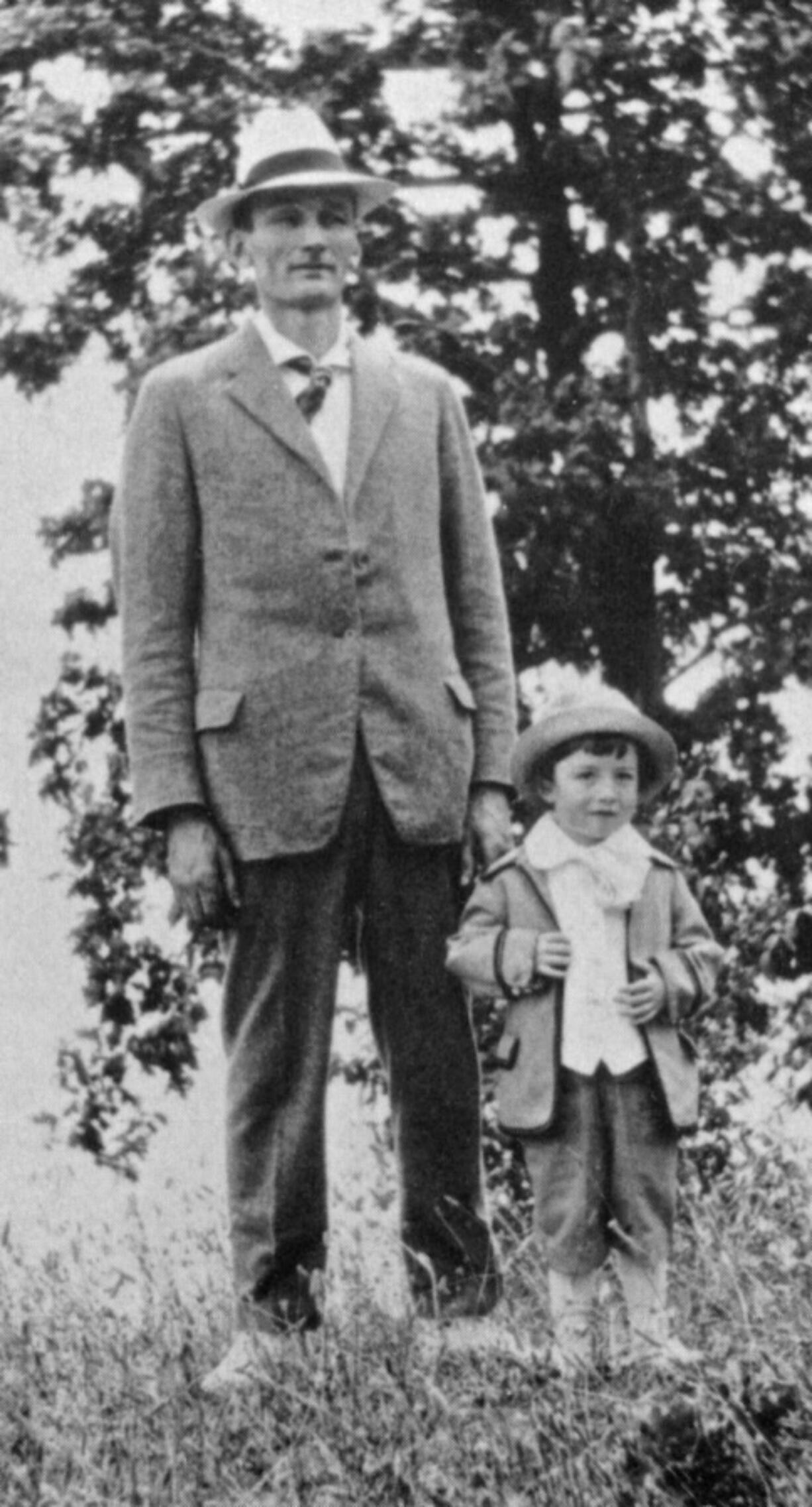 John Roffler (1879-1924) stands with his son Harold in this photo taken in about 1920. Employing the skills he learned while helping build the Pittock-Leadbetter House in 1902, Roffler went on to build several local houses echoing the Queen Anne style of that home.